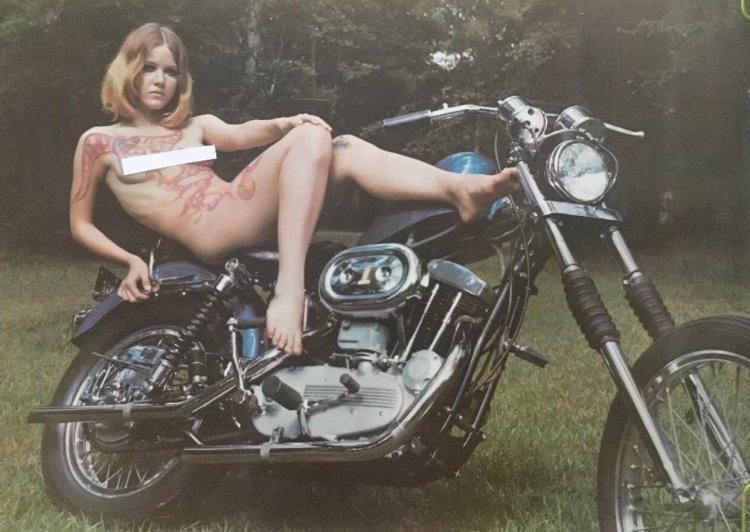 A motorcycle with a girl