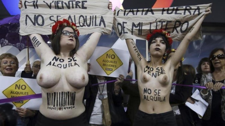 Feminists with naked breasts