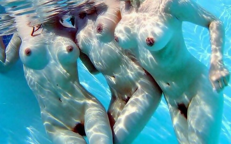 Naked women in water