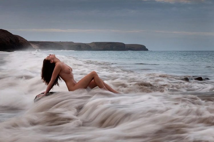 Naked women on the seashore