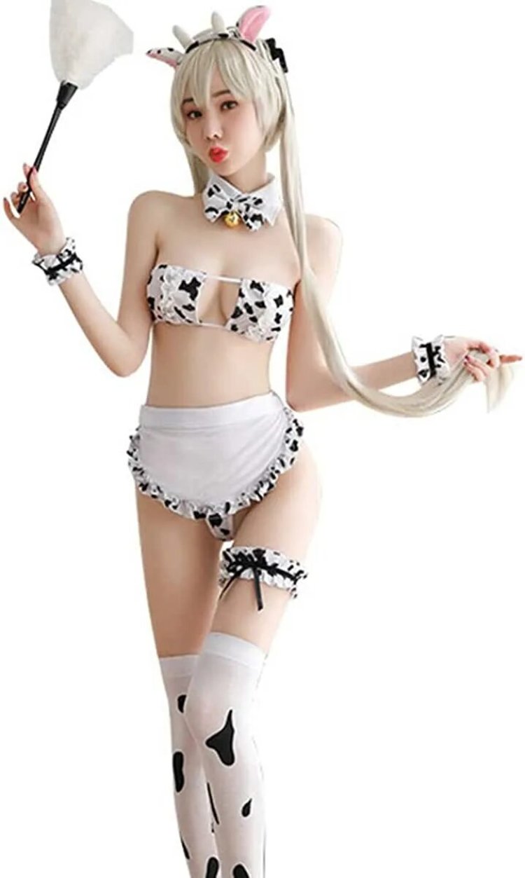 Girls in a cow costume