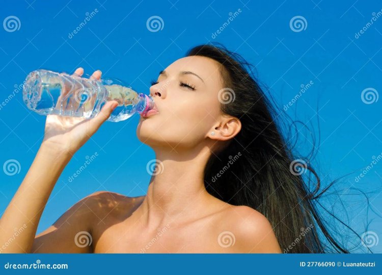 Girl with a bottle of water