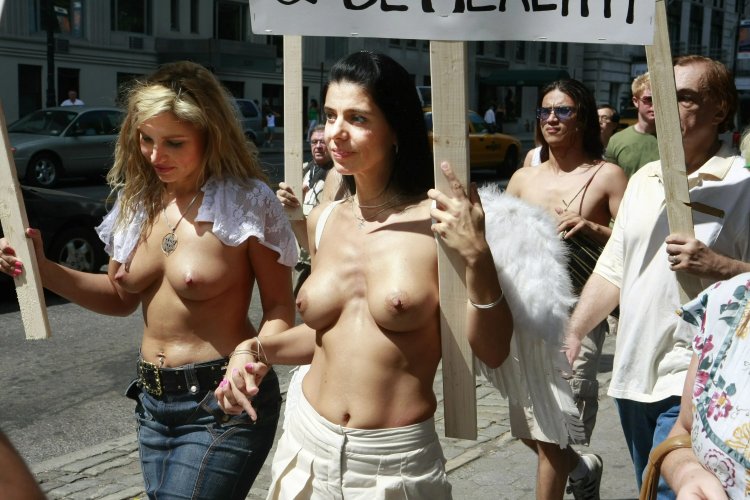 Women walk with naked tits