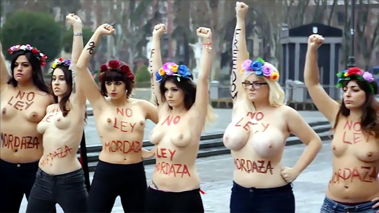 Feminists with naked breasts