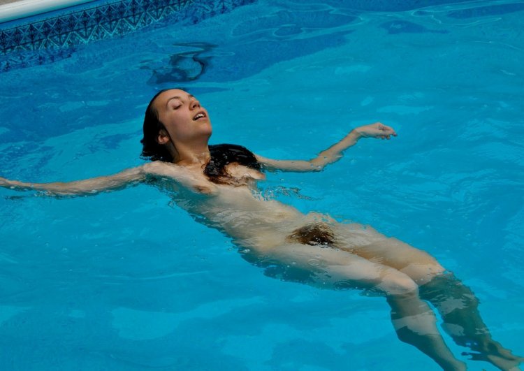 Naked in the swimming pool