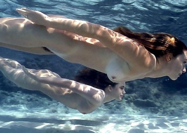 Naked women in water