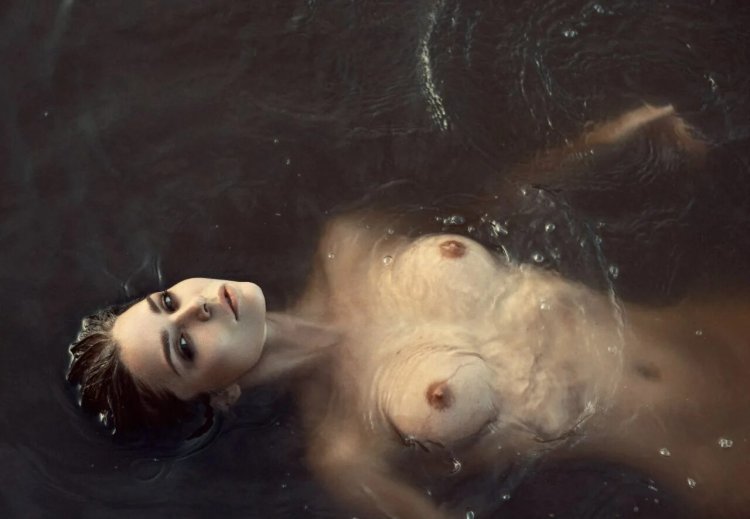 Naked girls in water