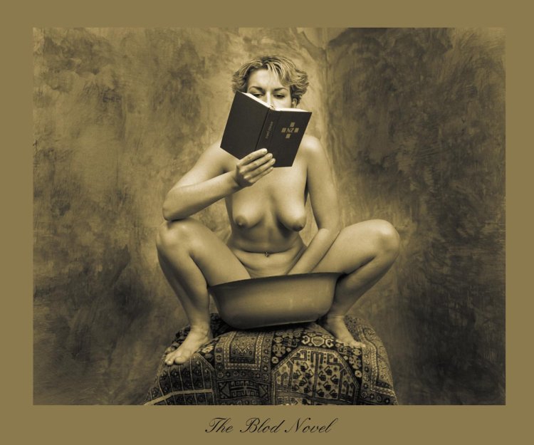 Photo shoot of a girl with a book nude