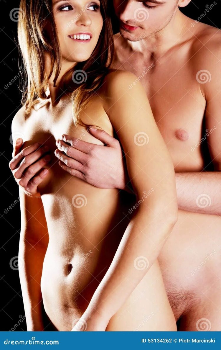 A naked man hugs a naked woman