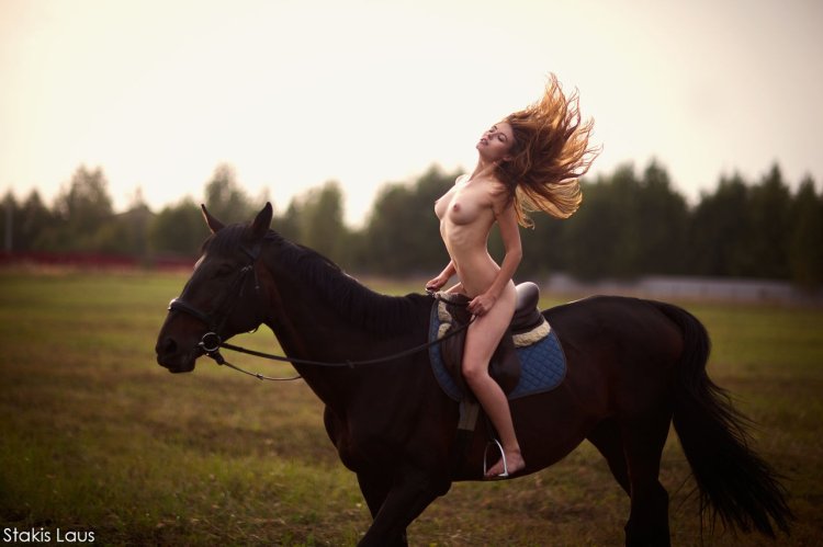 Naked girls on a horse