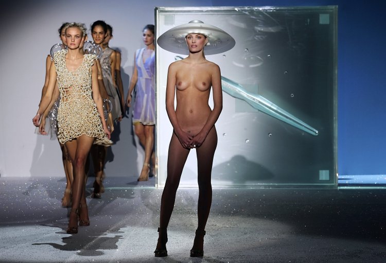 Naked fashion model on the catwalk