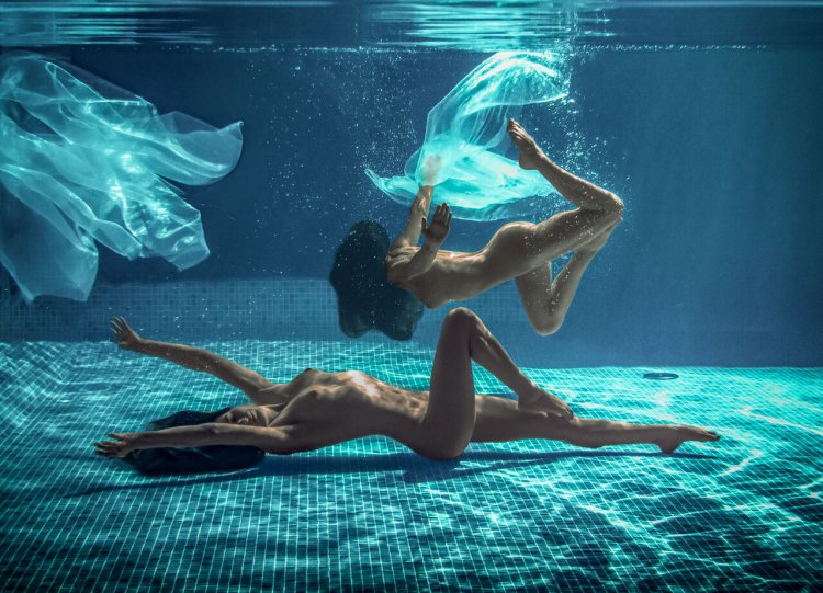 Naked girls in water