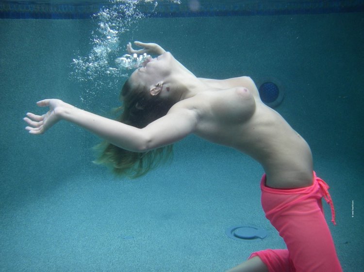 Naked boobs under water