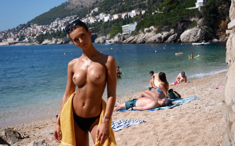 On the beach Topless