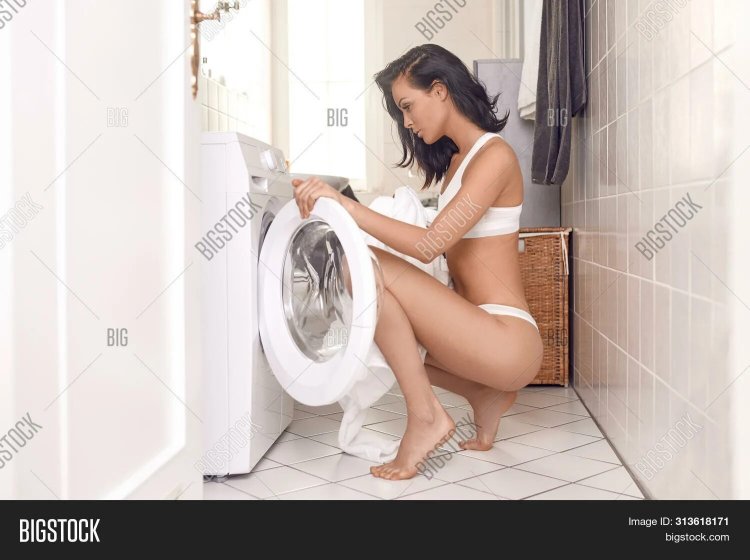 Woman at the washing machine